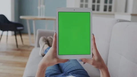 Mock-up Tracking or Green Screen Display on Tablet PC. Point of view. Girl Using Stock Footage 122417302