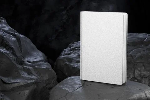 A mock-up of a white notebook on dark stones. Blank blank notepad to advertis Stock Illustration