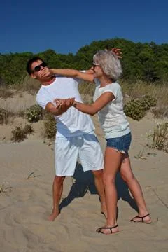 Mocking quarrel at a beach Stock Photos