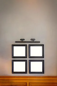 Mockup with 4 frames for a painting or photograph, copy space, vertical Stock Photos