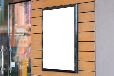 Mockup of Blank photo frames on the wall for your design Stock Photos
