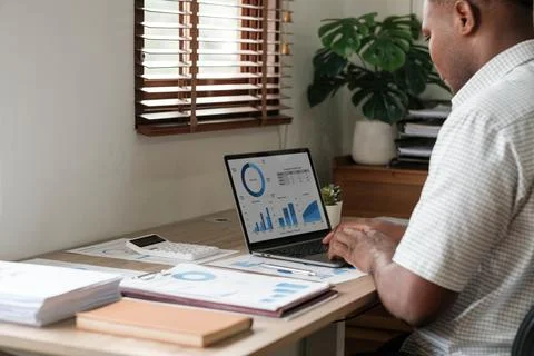Mockup, blank screen laptop computer. Business man working on laptop computer on Stock Photos