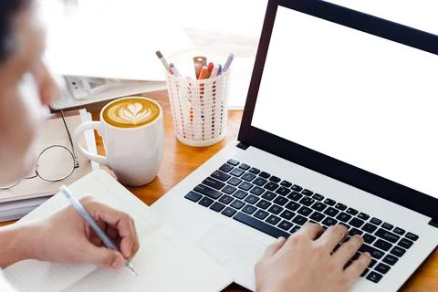 Mockup Copy Space Computer Notebook Laptop Concept, a man's hand using a lapt Stock Photos