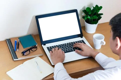 Mockup Copy Space Computer Notebook Laptop Concept , a man's hand using a lap Stock Photos