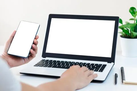 Mockup Copy Space Computer Notebook Laptop Concept , a man's hand using a lap Stock Photos