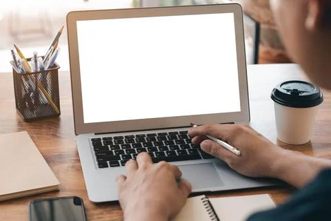 Mockup Copy Space Computer Notebook Laptop Concept , a man's hand using a lap Stock Photos