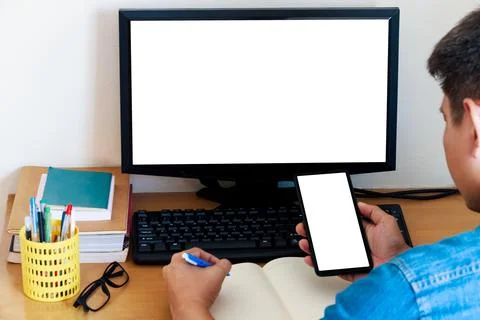 Mockup Copy Space Computer screen and smartphone screen Concept. Stock Photos