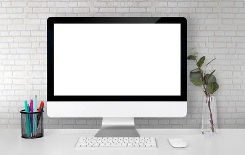 Mockup display screen blank computer on desk with white wall, office and work 스톡 사진