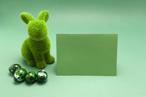Mockup Easter green bunny, rabbit with blue colored chicken quail eggs, empty Stock Photos