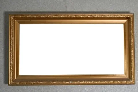 Mockup. An empty picture frame is hanging on the wall Stock Photos