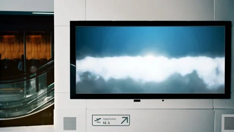 Mockup with floating clouds on the wall in a public place, airport Stock Footage 156615761
