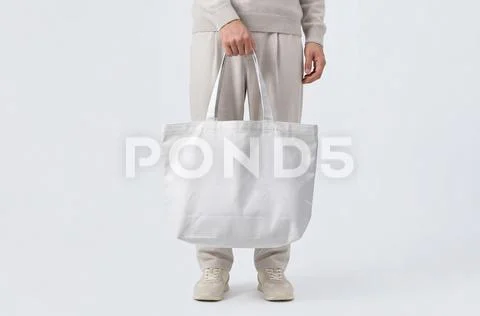 Mockup of a handle bag being held Modèle PSD