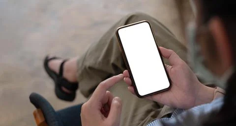 Mockup image blank white screen cell phone.women hand holding texting using Stock Photos