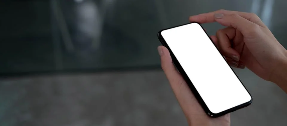 Mockup image blank white screen cell phone.women hand holding texting using.. Stock Photos