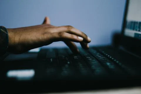 Mockup image of a hand touching on laptop computer touchpad Stock Photos
