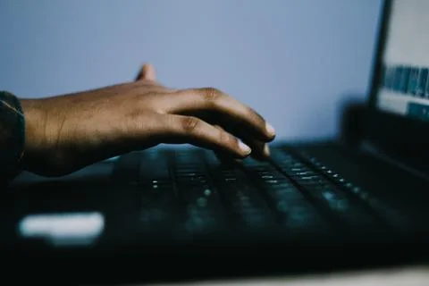 Mockup image of a hand touching on laptop computer touchpad Stock Photos