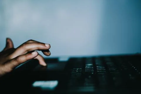 Mockup image of a hand touching on laptop computer touchpad Stock Photos