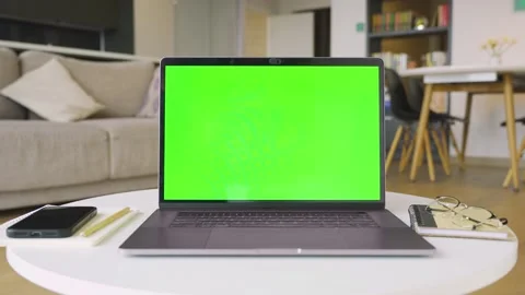 Mockup image of laptop computer with green screen chromakey for advertising app. Stock Footage 201921423