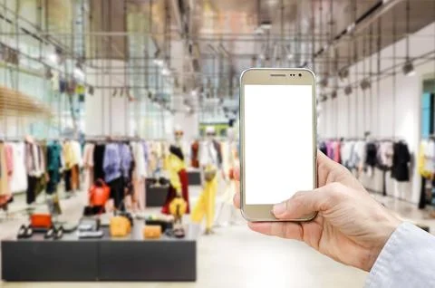 Mockup image of man hand holding gold mobile phone with blank white screen .. Stock Photos