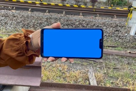 Mockup image of a smartphone with a blue screen Stock Photos