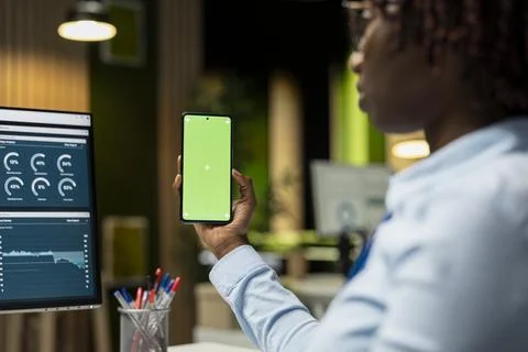 Mockup isolated display on smartphone held by a professional manager Stock Photos