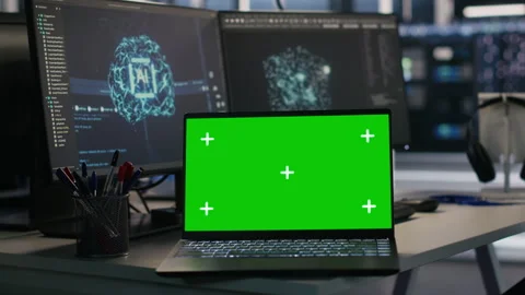 Mockup laptop and computer in data center used in AI model deployment Stock Footage 309623713