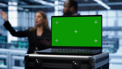 Mockup laptop in data center running error checking software monitoring hardware Stock Footage 277645351