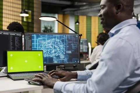 Mockup laptop used by software developer in AI tech company workspace Stock Photos