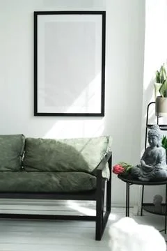 A mockup with a large black frame on the wall. Foto stock