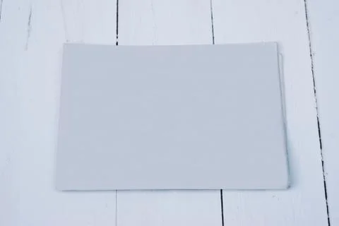 The MockUp of the newspaper on a bench. Stock Photos