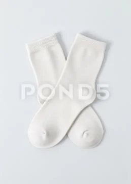 Mockup of a pair of socks together upside down on a white background Template PSD