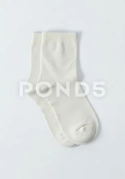 Mockup of a pair of socks together on a white background Template PSD