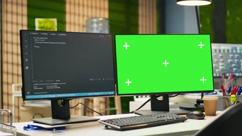Mockup PC in empty IT startup office displaying programming languages Stock Footage 313014792