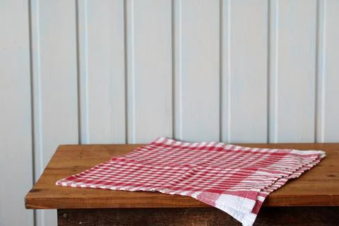 Mockup rural kitchen, an empty table with a checkered red tablecloth. an empty Foto stock