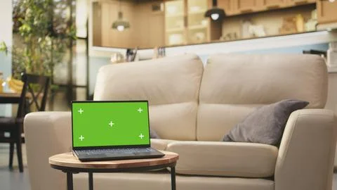Mockup screen replacement on laptop on empty small coffee table Stock Photos