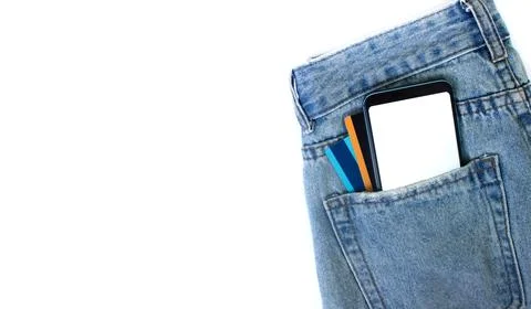 Mockup Smartphone with empty screen and credit cards in pocket jeans on white Stock Photos