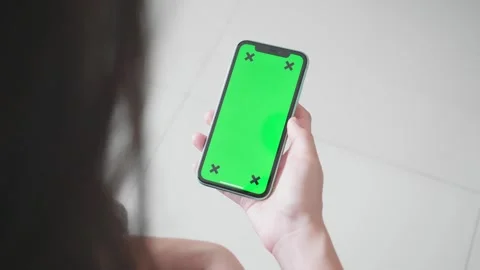 Mockup of a Smartphone with Green Screen Stock Footage 315975424