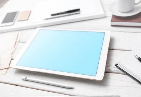 Mockup of tablet pc on the table Fotos de archivo
