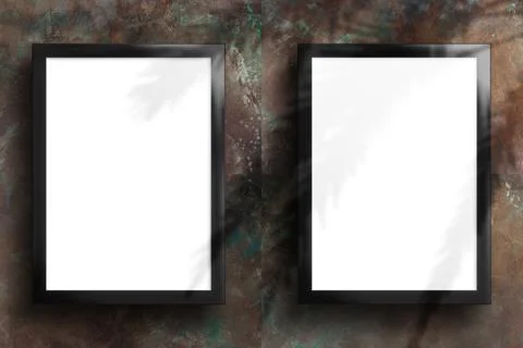 Mockup two vertical posters with blank paper close up with a black frame on.. Stock Photos