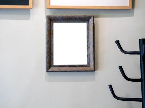 Mockup white blank space in vertical wooden square picture frame in private.. Stock Photos