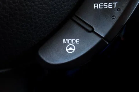 Mode button inside a car. Crop fragment. 库存照片