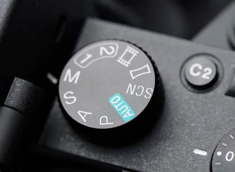 Mode dial on mirrorless camera Stock Photos
