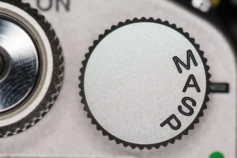 Mode dial on slr camera Stock Photos