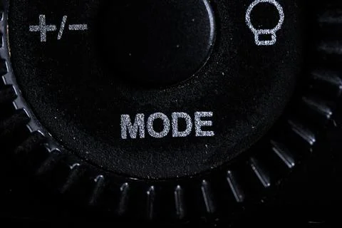 The mode icon button is close on the flash for camera device. Old and dirty Stock-Fotos