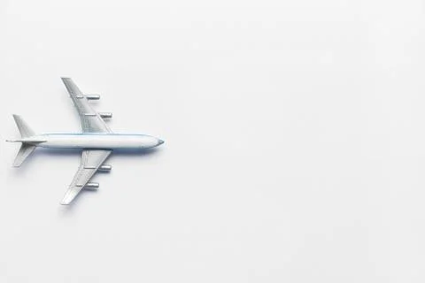 Model airplane on a white background with a top view and copy space. Stock Photos