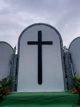 Model altar built from styrofoam with a simple black cross Stock Photos