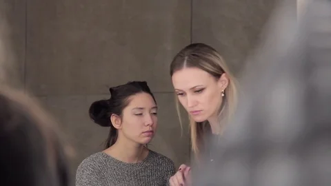 Model and make-up artist at work with eyes make-up Stock Footage 72602470