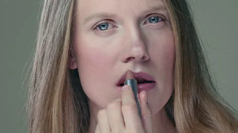 Model applying Lipstick Stock Footage 63032609