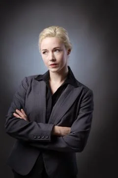 Model with arms folded Stock Photos