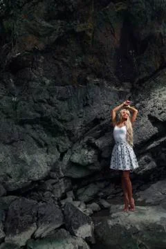 The model on the background of the rocks Stock Photos